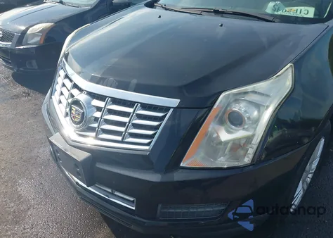 2014 Cadillac Srx Luxury Collection z USA, uszkodzony, nr VIN 3GYFNBE37ES687840